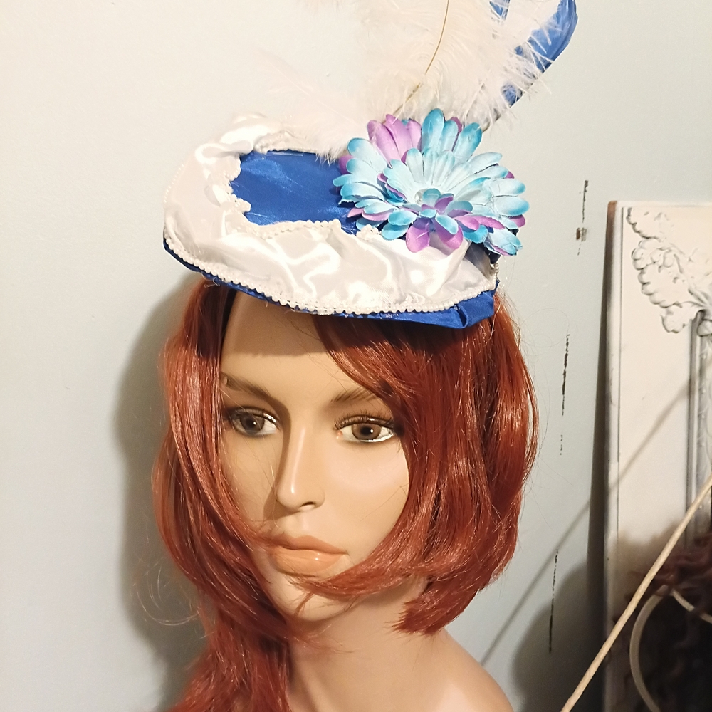 Elegant Blue and White Fascinator with Floral Accent